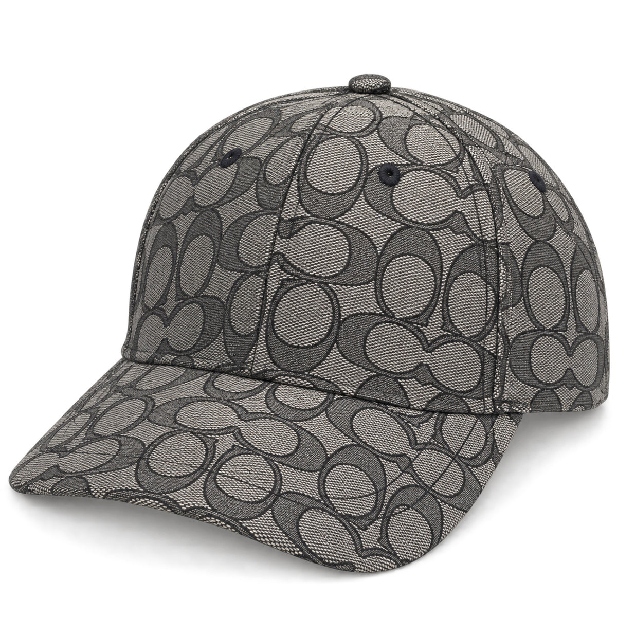 Detalle de textura tejida del gorro Coach Signature