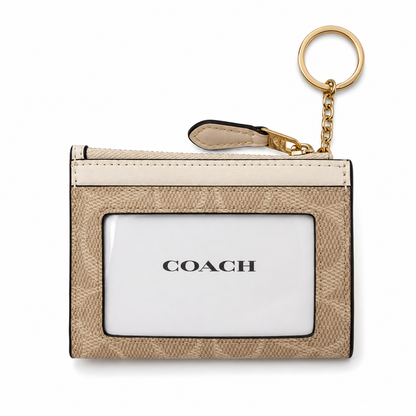 Tarjetero Coach beige con herrajes dorados - vista posterior